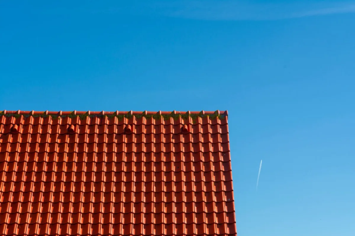 Tile roof gable in full sun, the kind of exposure that sets roof life in Grand Junction, CO